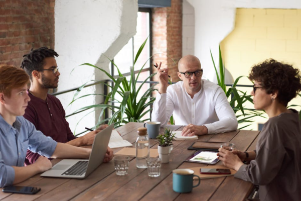 A business intermediary presenting a portfolio of vetted factories to an international client.